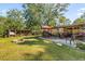 Spacious backyard with firepit and large deck at 115 Galloway Ct, Moncks Corner, SC 29461