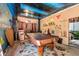 Game room features a pool table, bar area, and unique ceiling art at 115 Galloway Ct, Moncks Corner, SC 29461