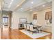 Formal dining room with hardwood floors, neutral color palette, and ample natural light at 104 Beach St, Mount Pleasant, SC 29464