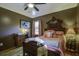 Charming bedroom featuring an antique bed and hardwood floors at 205 Claussen St, Summerville, SC 29483