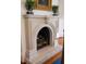 Elegant arched fireplace with ornate detailing at 140 Flyway Dr, Kiawah Island, SC 29455