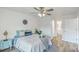 Cozy bedroom with a queen bed and ensuite bathroom at 202 Greenmeadow Dr, Goose Creek, SC 29445