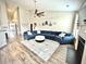 Open living space featuring a sectional sofa and hardwood floors at 139 Royal Star Rd, Summerville, SC 29486