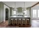 Gourmet kitchen with island, stainless steel appliances, and ample counter space at 3215 Pine Needle Ln, Seabrook Island, SC 29455