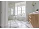 Elegant bathroom with freestanding tub, shower, and dual vanity at 3215 Pine Needle Ln, Seabrook Island, SC 29455