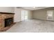 Living room with fireplace and sliding glass doors at 216 Sandra Ln, Ladson, SC 29456