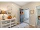 Bright and airy entryway with decorative console table and mirror at 1105 Ark Shell Dr, Summerville, SC 29485