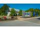 Community entrance with signage, landscaping, and covered seating area at 145 Hedera Ct, Summerville, SC 29486