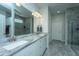Double vanity bathroom with granite countertop and large shower at 145 Hedera Ct, Summerville, SC 29486