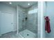 Shower with glass enclosure and grey tile surround at 145 Hedera Ct, Summerville, SC 29486