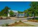 Community entrance featuring a modern building and landscaping at 145 Hedera Ct, Summerville, SC 29486