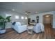 Spacious living room with hardwood floors and a cozy seating area at 145 Hedera Ct, Summerville, SC 29486