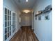 Bright entryway with hardwood floors and French doors at 145 Hedera Ct, Summerville, SC 29486