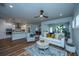Open living room features hardwood floors and a view into the kitchen at 145 Hedera Ct, Summerville, SC 29486