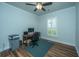 Bright home office features wood floors, built-in shelving, and a large window at 145 Hedera Ct, Summerville, SC 29486