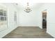 Bright dining room features hardwood floors and a chandelier at 2104 Rockport Ct, Summerville, SC 29483