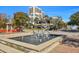 Community fountain with a bird sculpture, adding to the neighborhood's charm at 330 Concord St # 15E, Charleston, SC 29401