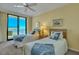 Guest bedroom with two twin beds and ocean view at 330 Concord St # 15E, Charleston, SC 29401