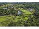 Aerial view of golf course community with houses and waterways at 121 High Hammock Villas # 121, Seabrook Island, SC 29455