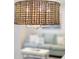 Close-up of a stylish woven light fixture at 121 High Hammock Villas # 121, Seabrook Island, SC 29455