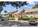 Tan colored building exterior with parking at 121 High Hammock Villas # 121, Seabrook Island, SC 29455