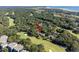 Aerial view of property showing location on golf course with ocean in background at 121 High Hammock Villas # 121, Seabrook Island, SC 29455