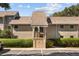 Tan colored building exterior with parking at 121 High Hammock Villas # 121, Seabrook Island, SC 29455