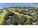 Property location shown in wider aerial view near golf course and ocean at 121 High Hammock Villas # 121, Seabrook Island, SC 29455