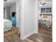 Bright hallway connecting two bedrooms with light wood flooring at 121 High Hammock Villas # 121, Seabrook Island, SC 29455