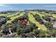 Property location shown in wider aerial view near golf course and ocean at 121 High Hammock Villas # 121, Seabrook Island, SC 29455