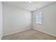 Bright bedroom with neutral carpeting and a window with blinds at 124 Pontoria Dr, Summerville, SC 29483