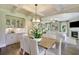 Open concept dining room with built-in cabinetry and view of the living room at 107 Grange Cir, Summerville, SC 29486