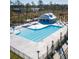 Community lap pool with adjacent sundeck at 175 West Bradford Pointe Dr, Summerville, SC 29486