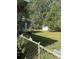 Fenced backyard offering privacy and a storage shed at 8520 Delhi Rd, North Charleston, SC 29406