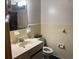 A bathroom with a toilet and vanity at 8520 Delhi Rd, North Charleston, SC 29406