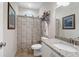 Clean bathroom with granite countertop and shower/tub combo at 1717 Sc-45, McClellanville, SC 29458