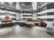 Relaxing basement rec room with sectional sofa and striped walls at 1913 Mooring Line Way, Mount Pleasant, SC 29466