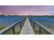 Long wooden dock extending into the water at 1913 Mooring Line Way, Mount Pleasant, SC 29466