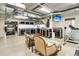 Spacious garage with golf cart, workshop area, and gym at 1913 Mooring Line Way, Mount Pleasant, SC 29466