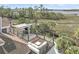 Spacious rooftop deck with water views, fireplace, and seating area at 1913 Mooring Line Way, Mount Pleasant, SC 29466