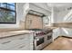 Luxury kitchen with professional range and custom cabinetry at 1913 Mooring Line Way, Mount Pleasant, SC 29466
