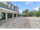 Three-car garage with brick exterior and basketball court at 1913 Mooring Line Way, Mount Pleasant, SC 29466