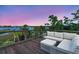 Peaceful deck overlooking the water with comfortable seating at 1913 Mooring Line Way, Mount Pleasant, SC 29466