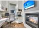 Home office with built-in shelving, desk, and fireplace at 1913 Mooring Line Way, Mount Pleasant, SC 29466