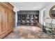 Functional mudroom with built-in storage and a glass-top desk at 1913 Mooring Line Way, Mount Pleasant, SC 29466