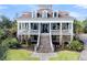 Grand two-story home with brick and white accents at 1913 Mooring Line Way, Mount Pleasant, SC 29466