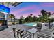 Relaxing pool area with patio furniture and sunset view at 1913 Mooring Line Way, Mount Pleasant, SC 29466
