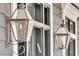 Elegant gas-lit lanterns flanking the front entry at 1913 Mooring Line Way, Mount Pleasant, SC 29466