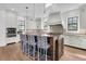 Modern kitchen with granite countertops and island seating at 1913 Mooring Line Way, Mount Pleasant, SC 29466