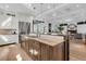 Open concept kitchen with large island and hardwood floors at 1913 Mooring Line Way, Mount Pleasant, SC 29466